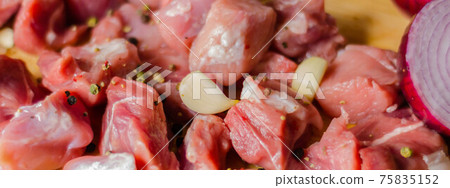raw meat cut into pieces, pork prepared for cooking, red meat raw meat cut into pieces, pork prepared for cooking, red meat 75835152