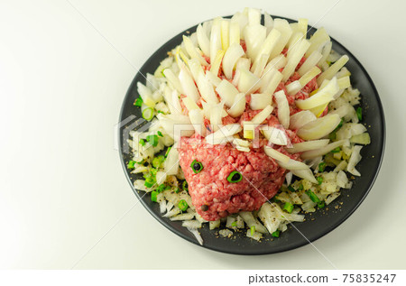 Traditional German dish called Mettigel,.Mett served as a Mett hedgehog Traditional German dish called Mettigel,.Mett served as a Mett hedgehog 75835247