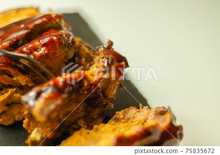 Pork ribs in a smoky flavour barbecue seasoning with a honey barbecue sauce Pork ribs in a smoky flavour barbecue seasoning with a honey barbecue sauce 75835672