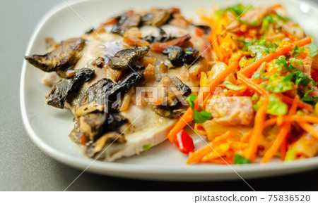 Chicken breast with sliced mushrooms, ham, in cheese sauce with pasta salad Chicken breast with sliced mushrooms, ham, in cheese sauce with pasta salad 75836520