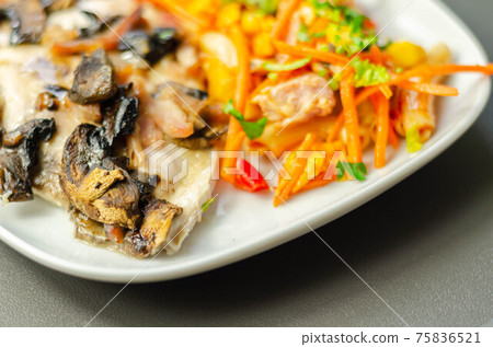 Chicken breast with sliced mushrooms, ham, in cheese sauce with pasta salad Chicken breast with sliced mushrooms, ham, in cheese sauce with pasta salad 75836521