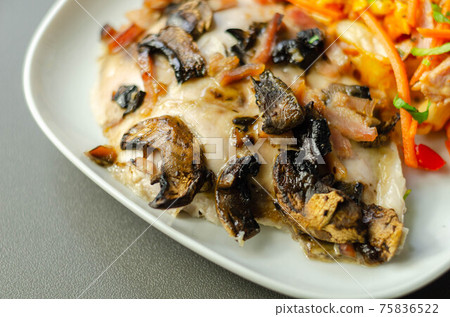 Chicken breast with sliced mushrooms, ham, in cheese sauce with pasta salad Chicken breast with sliced mushrooms, ham, in cheese sauce with pasta salad 75836522