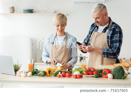Cook delicious meal together, healthy eating and vegetarian dish Cook delicious meal together, healthy eating and vegetarian dish 75837805