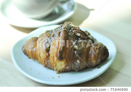 croissant ,caramel croissant and coffee 75840890