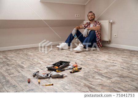 Selective focus on repair tools lying on laminate floor Selective focus on repair tools lying on laminate floor 75841753
