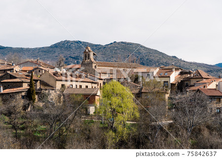 Scenic panoramic view of the the village of Horcajuelo de la Sierra during springtime Scenic panoramic view of the the village of Horcajuelo de la Sierra during springtime 75842637