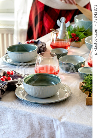 Christmas table setting with ceramic tableware Christmas table setting with ceramic tableware 75842873