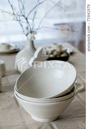 Set of empty craft white ceramic bowls 75842876