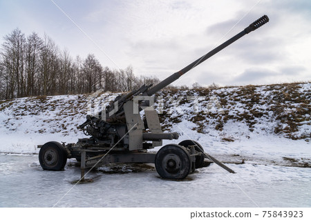 Russia. March 14, 2021. 37-mm automatic anti-aircraft gun AZP-39 sample of 1939 is displayed in the open air as a museum exhibit in the park Patriot of the city of Kronstadt. 75843923