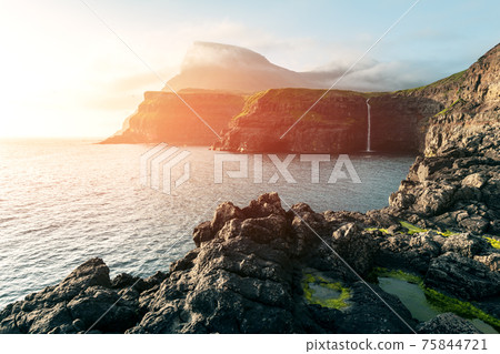 Mulafossur waterfall in Gasadalur, Vagar Island of the Faroe Islands. 75844721