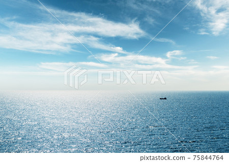 Lonely fishing ship trawler boat on ocean Lonely fishing ship trawler boat on ocean 75844764