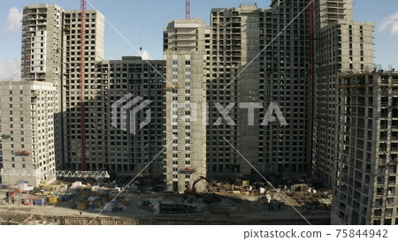 Aerial view of details of a generic high rise building construction site Aerial view of details of a generic high rise building construction site 75844942
