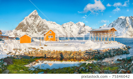 Breathtaking winter view of Sakrisoy village and snowy mountaines on background. Breathtaking winter view of Sakrisoy village and snowy mountaines on background. 75846042