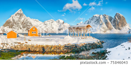 Breathtaking winter view of Sakrisoy village and snowy mountaines on background. Breathtaking winter view of Sakrisoy village and snowy mountaines on background. 75846043