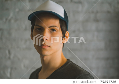 Men in T-shirts and caps Men in T-shirts and caps 75851786