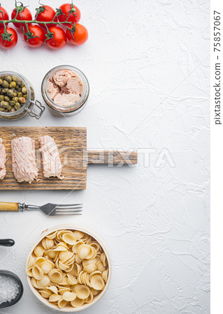Semolina tuna pasta ingredients, on white background, top view with copy space for text Semolina tuna pasta ingredients, on white background, top view with copy space for text 75857067