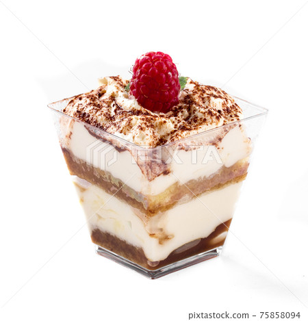 Isolated tiramisu trifle dessert with raspberry Isolated tiramisu trifle dessert with raspberry 75858094