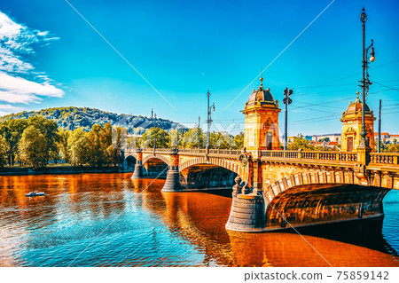 Beautiful view Old Bridge Legii (Most Legii) from the waterfront of the Vltava River.Prague.Czech Republic. 75859142