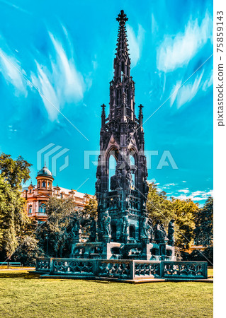 Kranner's fountain is a Neo-Gothic monument by the Vltava river on the Smetana Embankment. Prague, Czech Republic. 75859143
