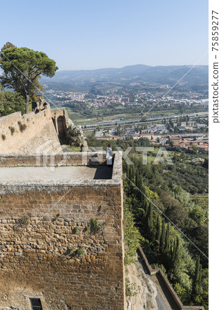 View of the valley from the tower of the mountain fortress wall of Orvieto, Umbria, Italy 75859277