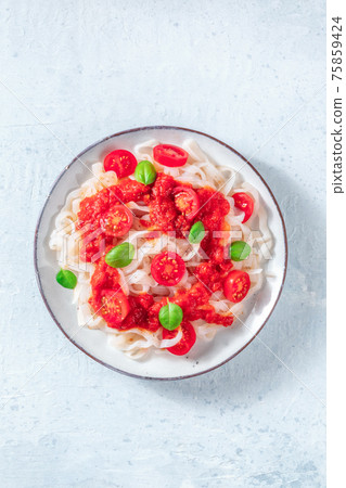 Konjac pasta with tomatoes, shot from above Konjac pasta with tomatoes, shot from above 75859424