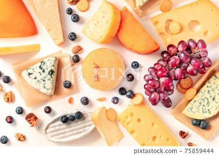 Cheese variety. An assortment of various cheeses, shot from above 75859444