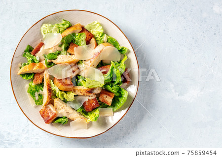 Chicken Caesar salad, overhead shot Chicken Caesar salad, overhead shot 75859454