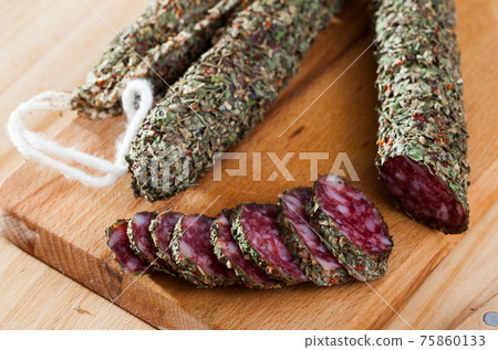 Catalan sausage fuet in herbs Catalan sausage fuet in herbs 75860133