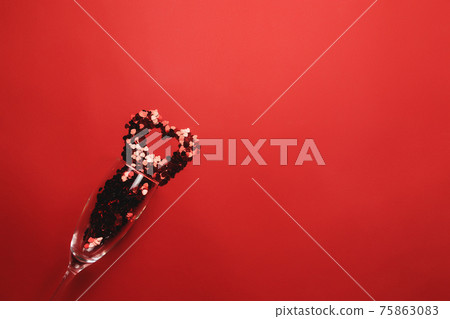 Valentine with wine glass, heart glitter on red background 75863083