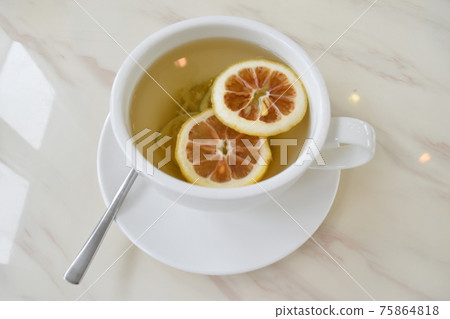 Sweet and sour warm green tangerine tea Sweet and sour warm green tangerine tea 75864818