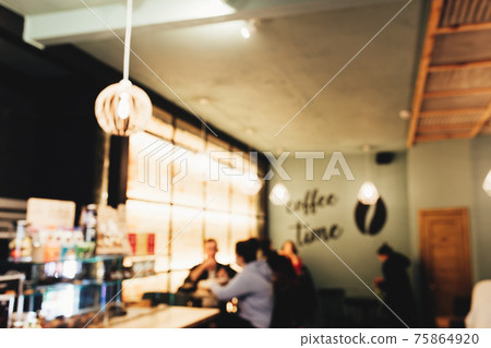 Blurred loft coffee shop with barista and customer 75864920