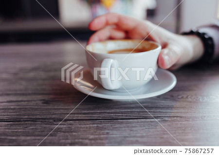 Hands man with coffee. Hands man with coffee. 75867257
