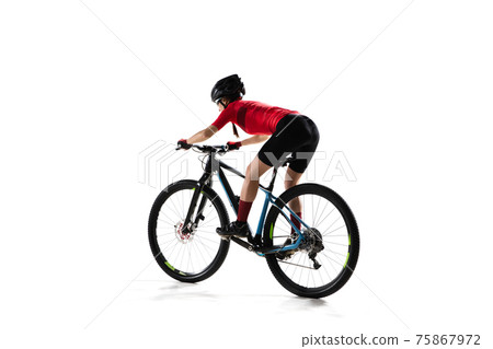 Professional female bike rider with road bike isolated over white background. 75867972
