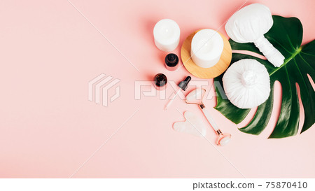 Natural organic cosmetics bottle of oil, cream, clay, salt, massage tool gua sha accessories flat layout copy space Natural organic cosmetics bottle of oil, cream, clay, salt, massage tool gua sha accessories flat layout copy space 75870410