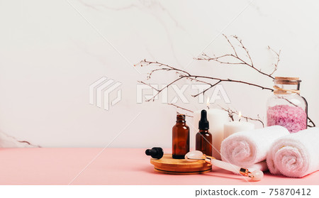 Natural organic cosmetics bottle of oil, cream, clay, salt, massage tool gua sha accessories copy space 75870412