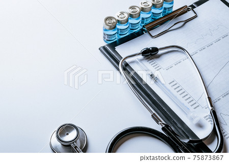 Covid vaccination. Healthcare medical infographic, doctor health stethoscope and analysis vaccination statistics on hospital background. Research data economy spreadsheet, business company concept. Covid vaccination. Healthcare medical infographic, doctor health stethoscope and analysis vaccination statistics on hospital background. Research data economy spreadsheet, business company concept. 75873867