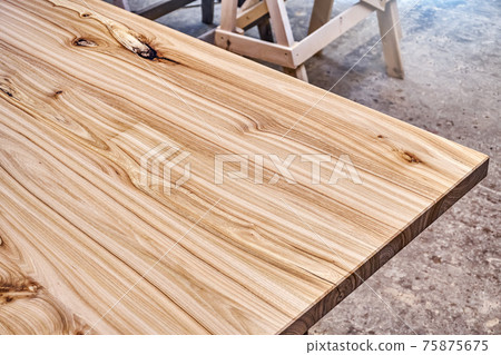 Live edge elm countertop in workshop close-up 75875675