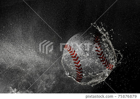 Baseball ball flying in water drops and splashes isolated on black background Baseball ball flying in water drops and splashes isolated on black background 75876879