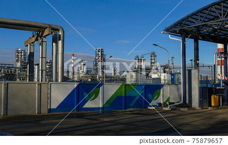 Corps of Moscow refinery in spring in clear weather Corps of Moscow refinery in spring in clear weather 75879657