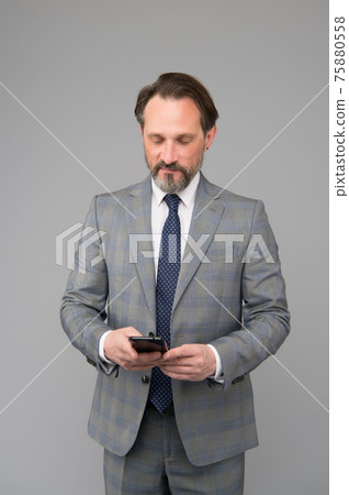 mature businessman answer email. professional business mature businessman answer email. professional business 75880558