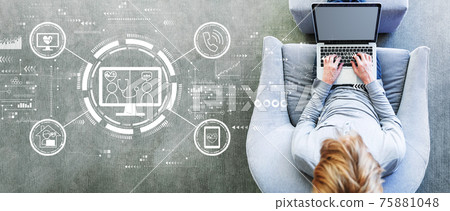 Telehealth theme with man using a laptop Telehealth theme with man using a laptop 75881048