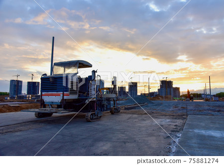 Slipform paver machine on road work at construction site. Slipform paver machine on road work at construction site. 75881274