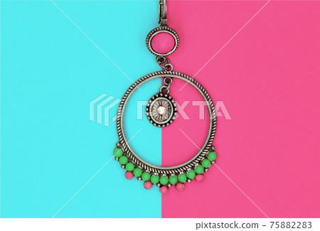 Ethnic decorations on colored sheets of paper. Ethnic decorations on colored sheets of paper. 75882283