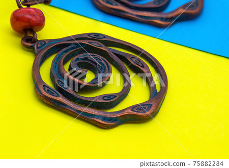 Ethnic decorations on colored sheets of paper. Ethnic decorations on colored sheets of paper. 75882284
