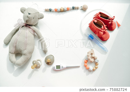 group of things for bathing baby on a light background group of things for bathing baby on a light background 75882724