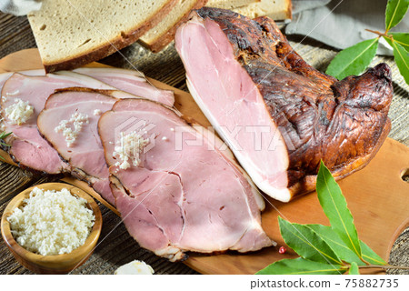 Bavarian smoked country ham with freshly grated horseradish and hearty farmhouse bread 75882735