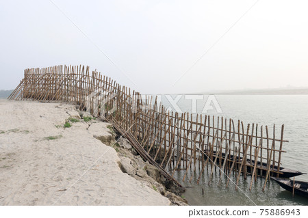 bamboo fence and wall for safety of beach sand 75886943