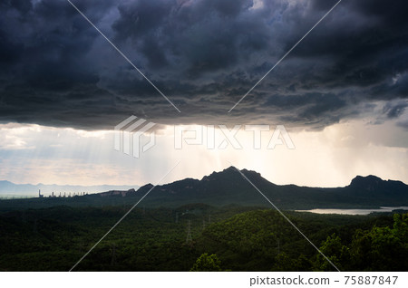 Storm over mountain. 75887847