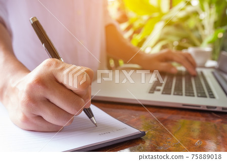 working with laptop. working with laptop. 75889018