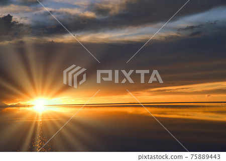 Evening view of Uyuni salt lake in Bolivia Evening view of Uyuni salt lake in Bolivia 75889443